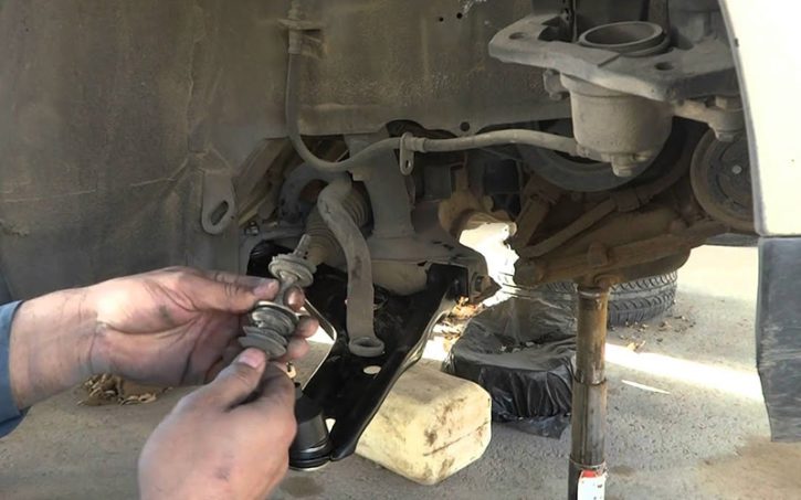 A person fixing a car