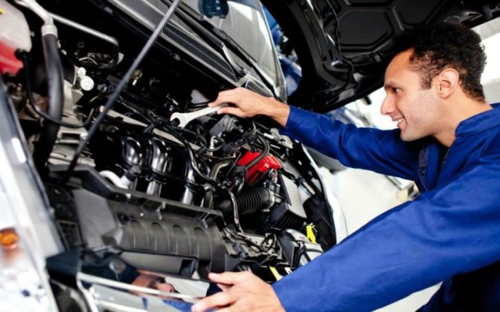 A person working on a car