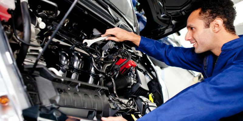 A person working on a car