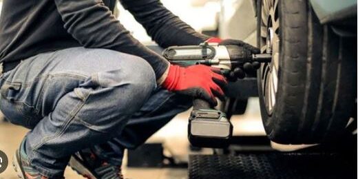 mechanic fixing the CV joint and Propshaft